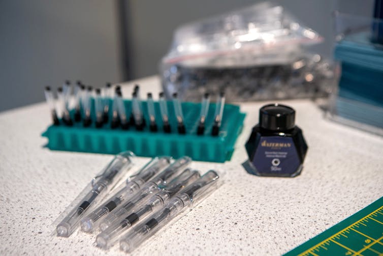 Pens waiting to be filled with ink.