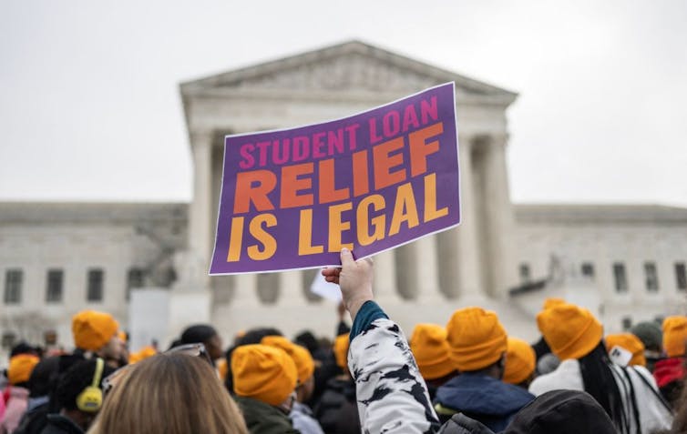 Supporters of student debt forgiveness demonstrate outside the US Supreme Court in Washington DC