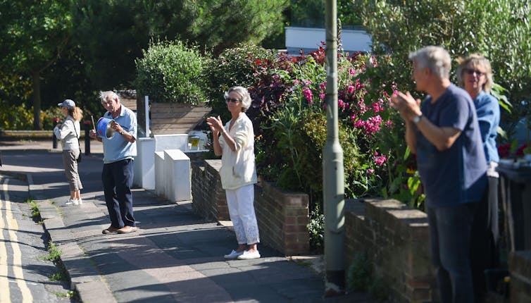 People in Brighton clapping for carers in July 2020