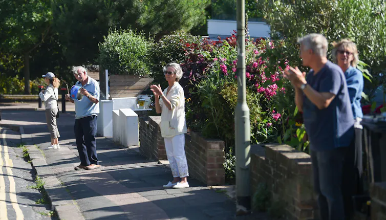 People in Brighton clapping for carers in July 2020