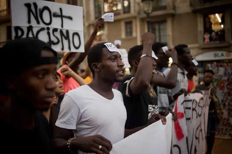 Protesters with banners.