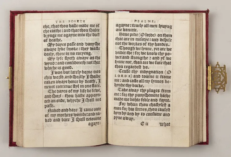 Open book with a manicule pointing to the words 'take away thy plagues from me'.