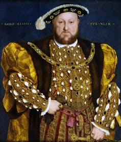 A portrait of Henry VIII in gold finery.