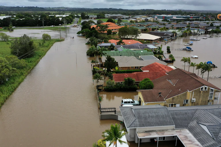 Aerial image of flooding from the Richmond River around the Britton family's home in Ballina, NSW, Thursday, February 23, 2022.3