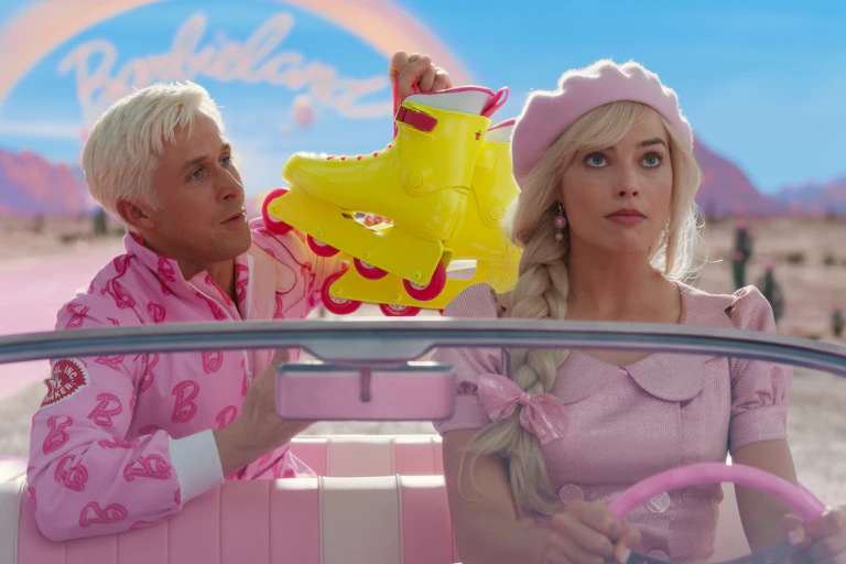 Barbie and Ken in a car
