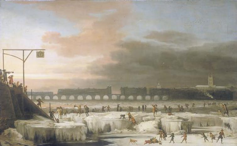 Painting of a frozen river Thames with many people playing in the foreground