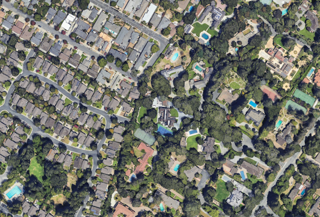 A satellite view shows Atherton's large properties, each of which could fit several home lots from a neighboring community, shown on the left.
