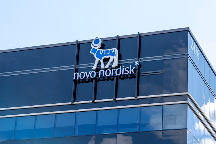 A building with Novo Nordisk's sign.