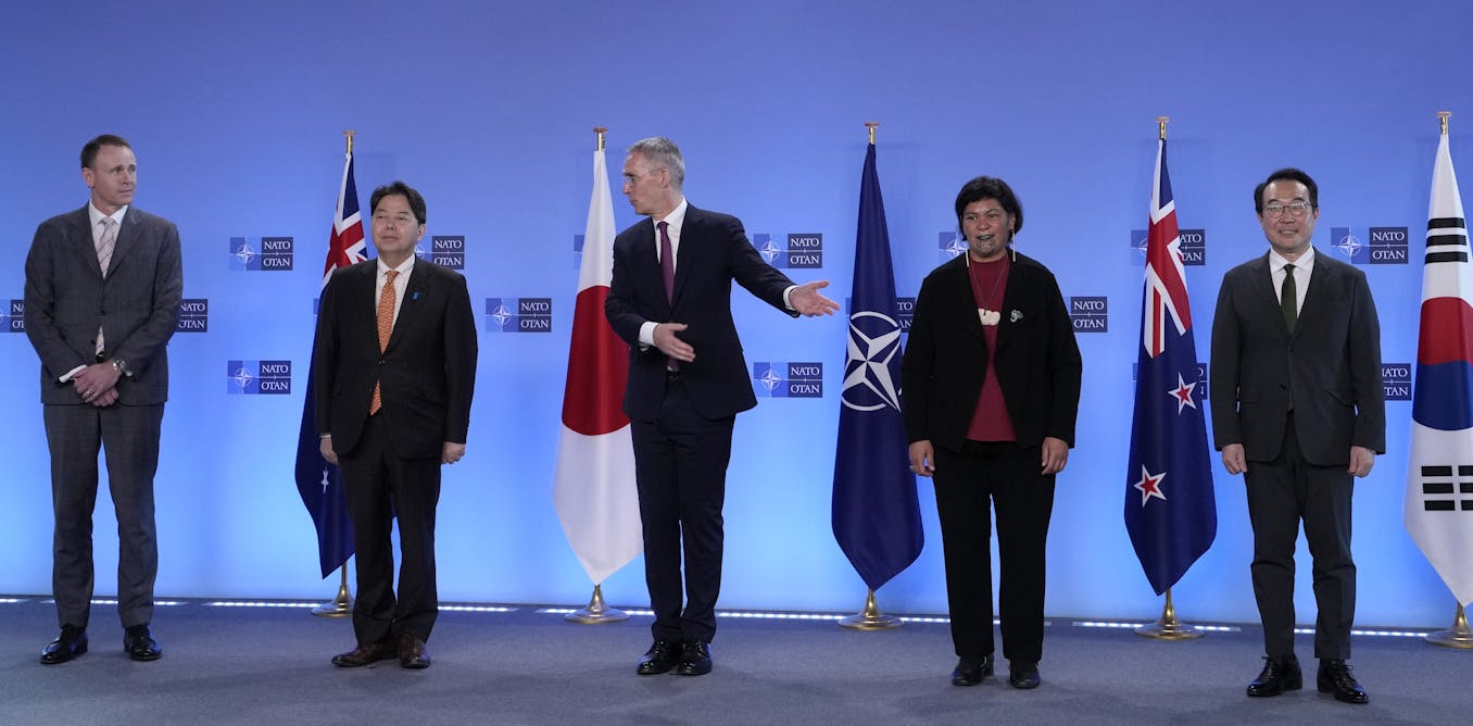 Why is NATO expanding its reach to the Asia-Pacific region?