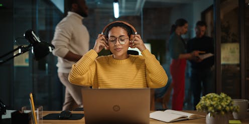 Workers hate office noise – but is using headphones to shut out colleagues the solution?