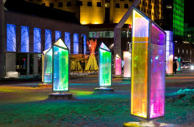 a cluster of prismatic multicoloured glass structures