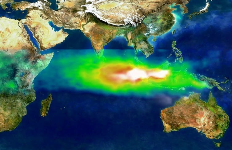 A large area of pollution shows in colors covering much of the Indian Ocean, including touch India, covering Indonesia and reaching Australia.
