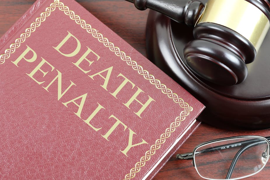A book on a desk with death penalty written on it