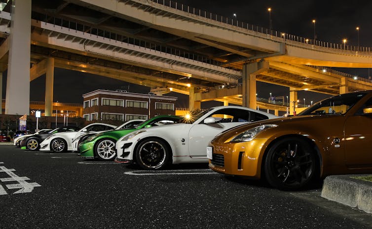 A nighttime car meeting in Tokyo, Japan.