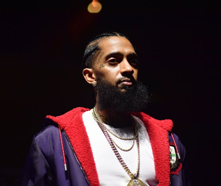 Rap star Nipsey Hussle looks out.