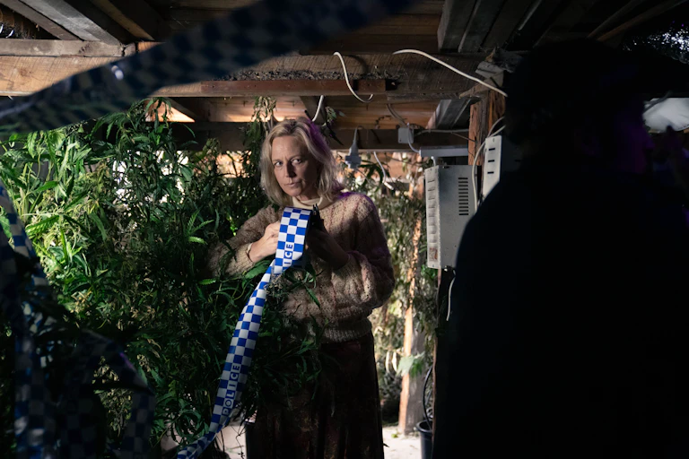 Marta Dusseldorp as Stella holds police tape