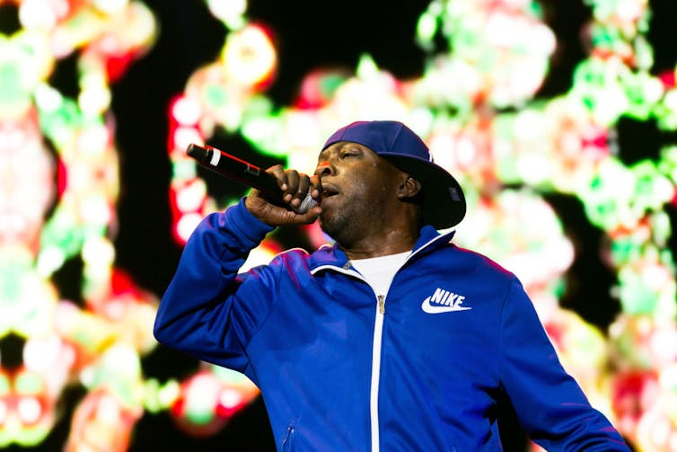 Phife Dawg of A Tribe Called Quest performs at a music festival.