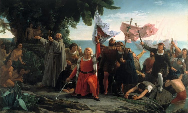 La escena representa a un navegante, Colón, de rodillas en la costa, alzando una bandera y rodeado de su tripulación, entre la que se encuentra un sacerdote que alza un crucifijo.