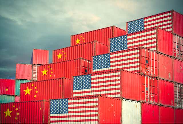 Cargo containers with Chinese and United States flags painted on them