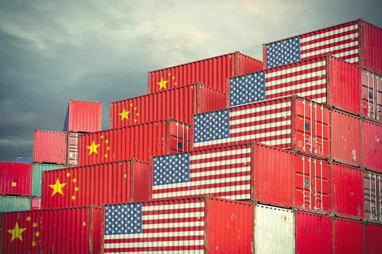 Cargo containers with Chinese and United States flags painted on them