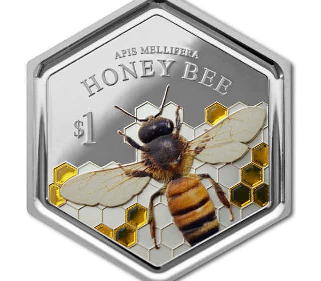 A New Zealand hexagonal collectors' coin issued in 2016 featuring the honeybee.