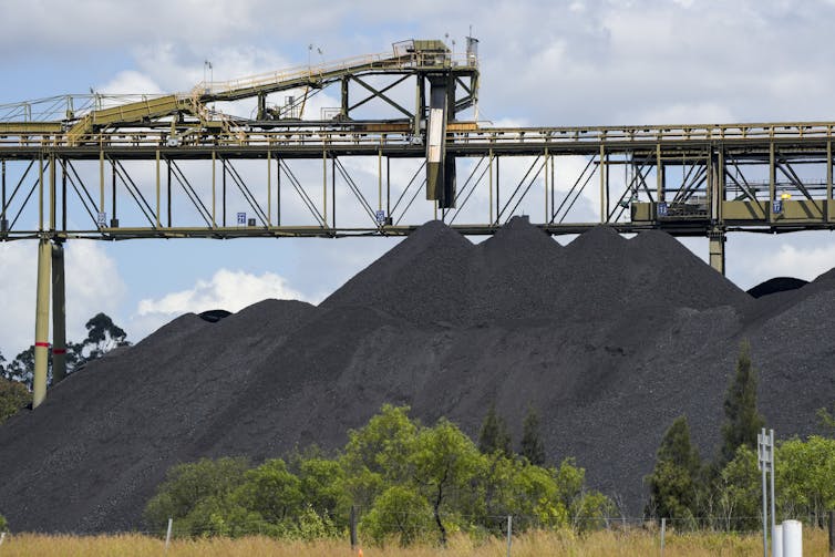 piles of coal and machinery