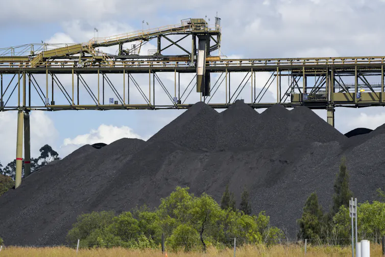 piles of coal and machinery