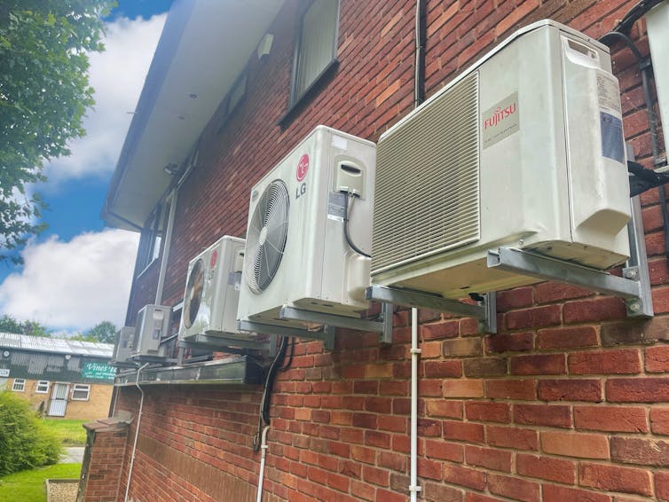 Air conditioning units on outside of a building
