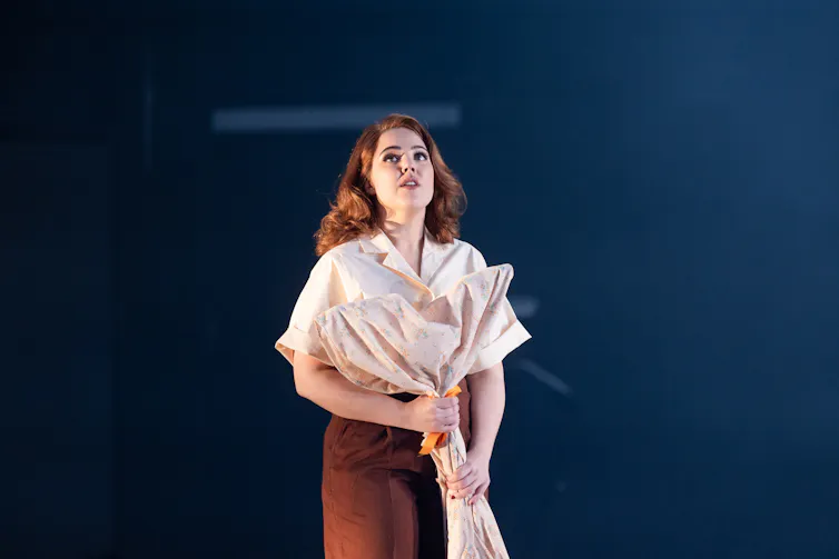 A woman on stage.