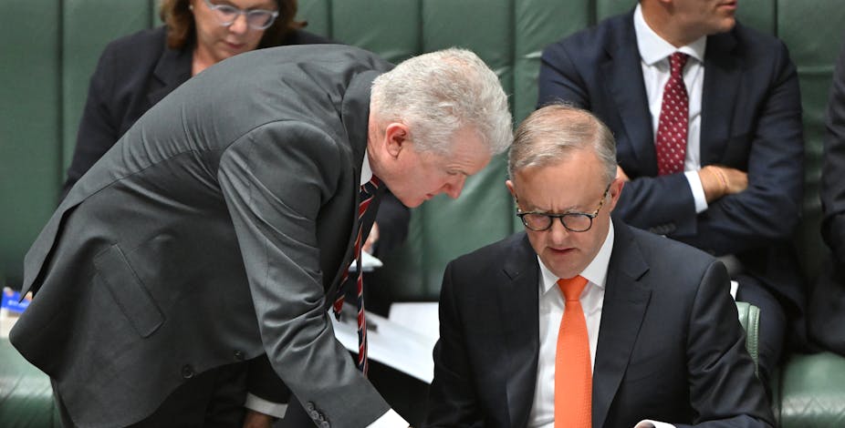 Minister for Employment Tony Burke and Prime Minister Anthony Albanese during Question Time in the House of Representatives at Parliament House in Canberra, Wednesday, November 30, 2022.