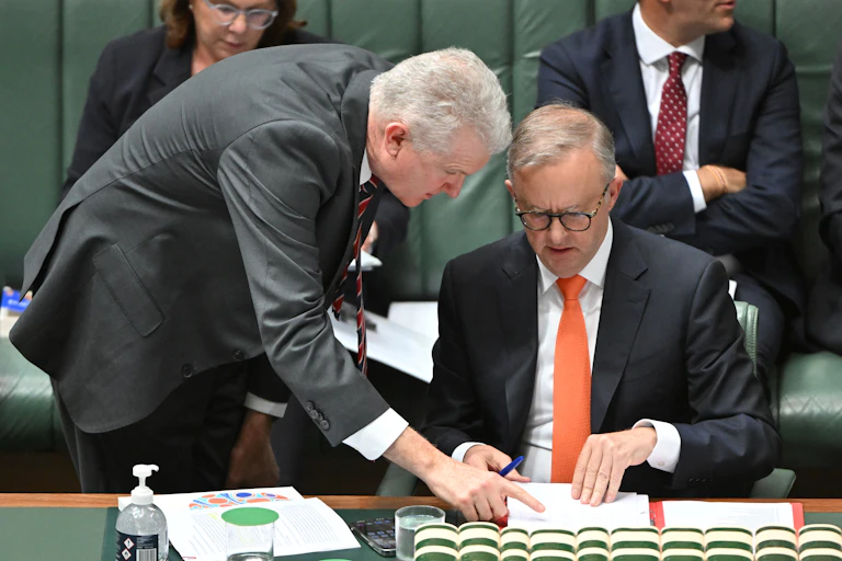 Minister for Employment Tony Burke and Prime Minister Anthony Albanese during Question Time in the House of Representatives at Parliament House in Canberra, Wednesday, November 30, 2022.