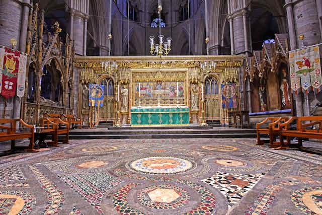 A frontal view of the High Altar and Cosmati pavement at Westminster Abbey.