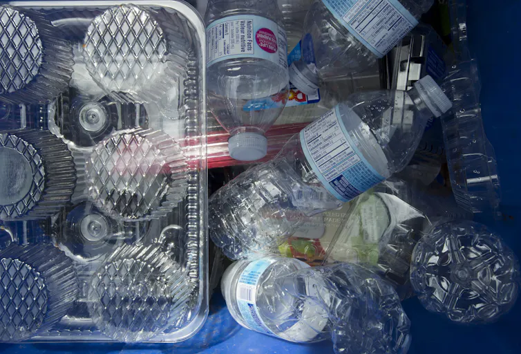 Disposed of plastic food and beverage containers.