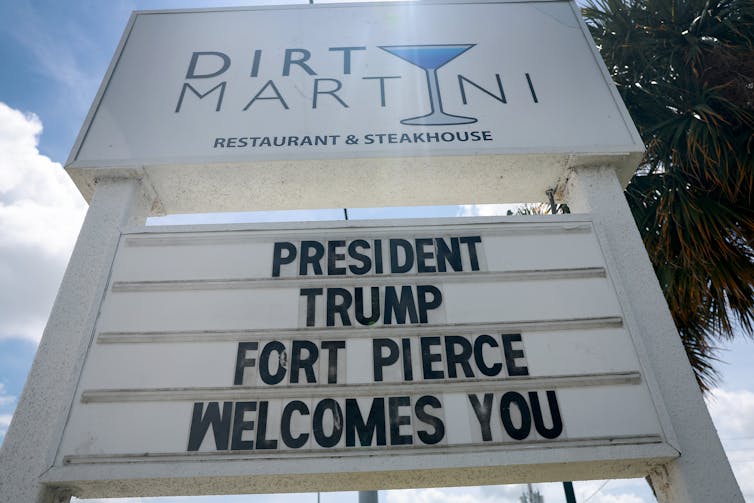 A large sign spells the words 'President Trump Fort Pierce welcomes you'