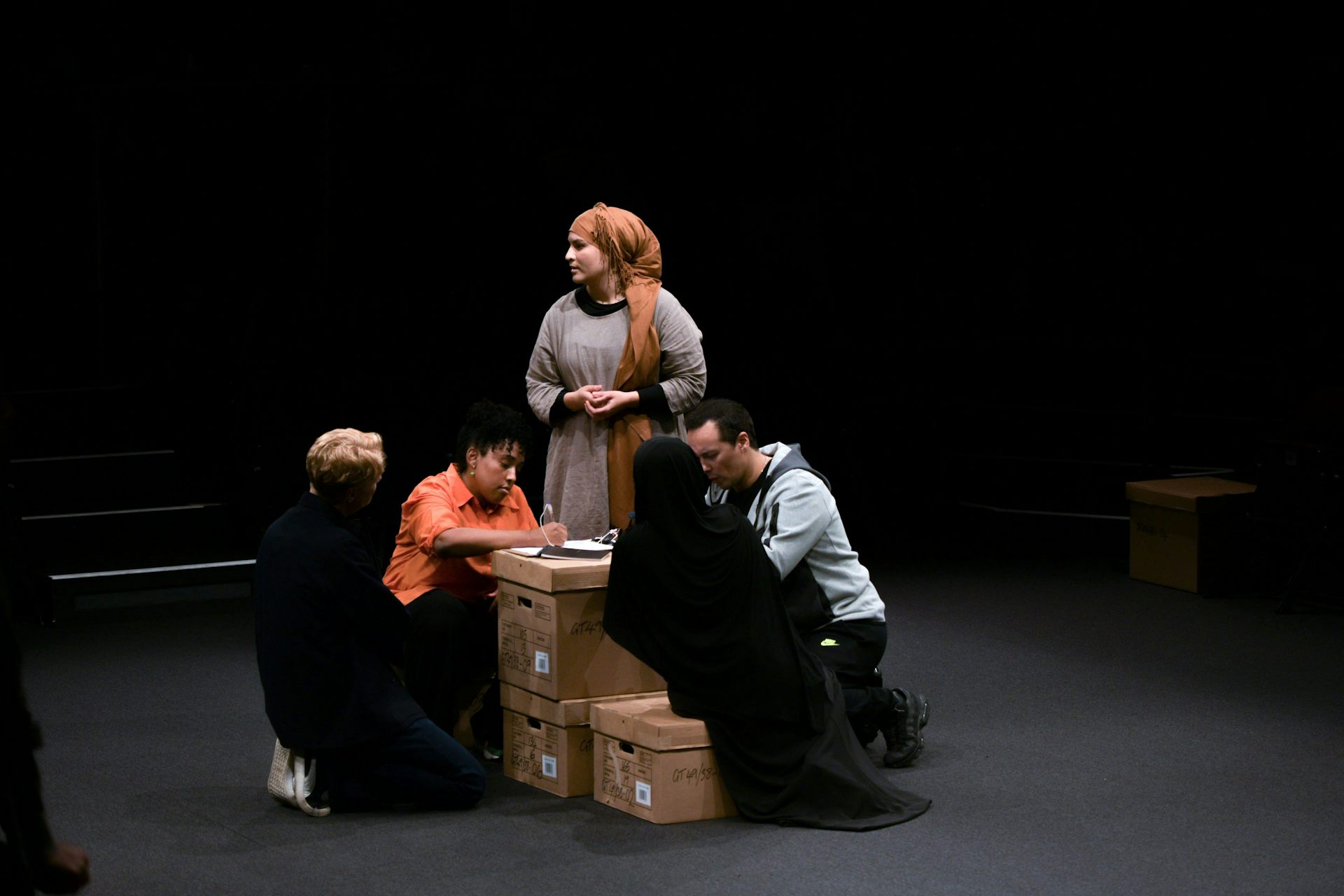Actors on a stage.