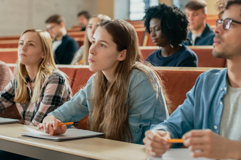 Students listening in lecture hall