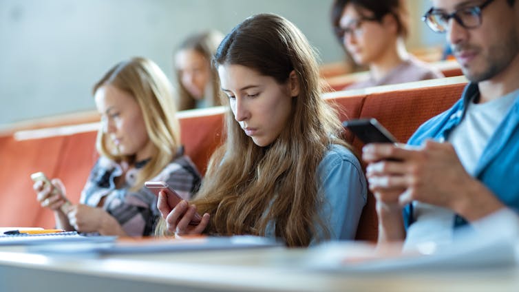Smartphones in classrooms being used by students