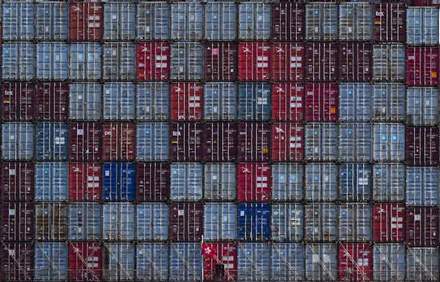 A wall of cargo containers.