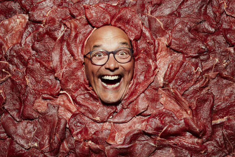 A man's head in meat.