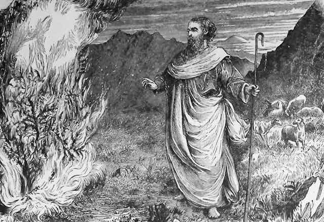 A black and white drawing showing Moses and the Burning Bush.