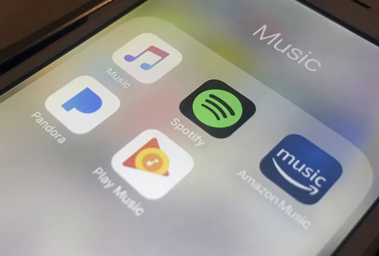 A phone screen displaying music streaming apps