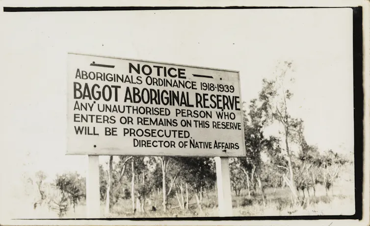 Sign reads: Any unauthorised person who enters or remains on this reserve will be prosecuted.