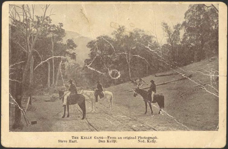 Three men on horseback.