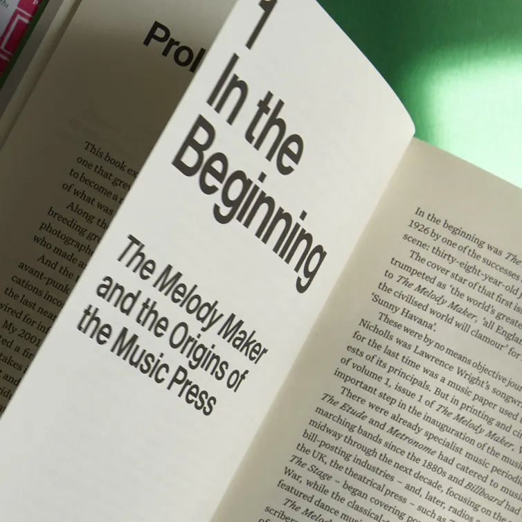 Pages from the book showing black text on white paper.