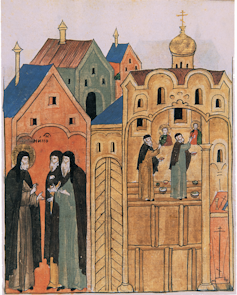 Painting of men in a huddle in front of tall colourful houses.