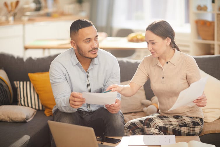 Parents looking at bills