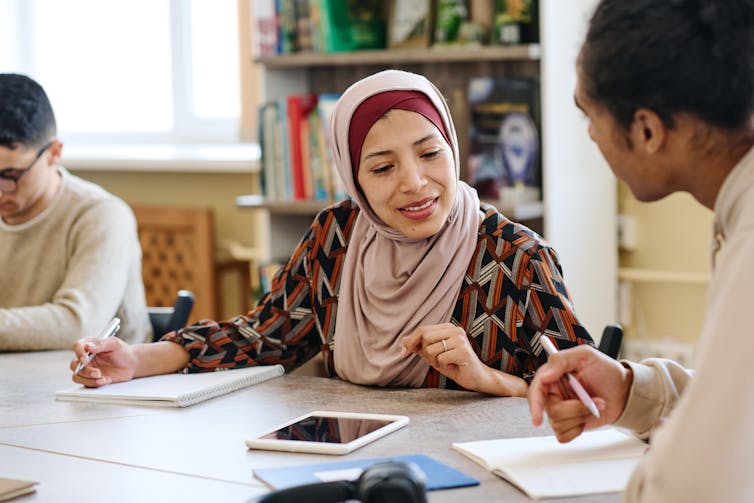 Woman wearing hijab in classroom