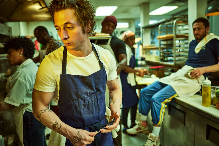 Cooks in a professional kitchen.