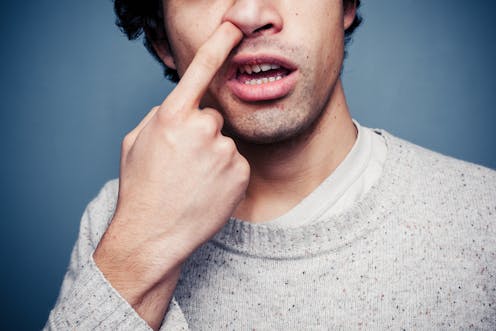 Does picking your nose really increase your risk of COVID?