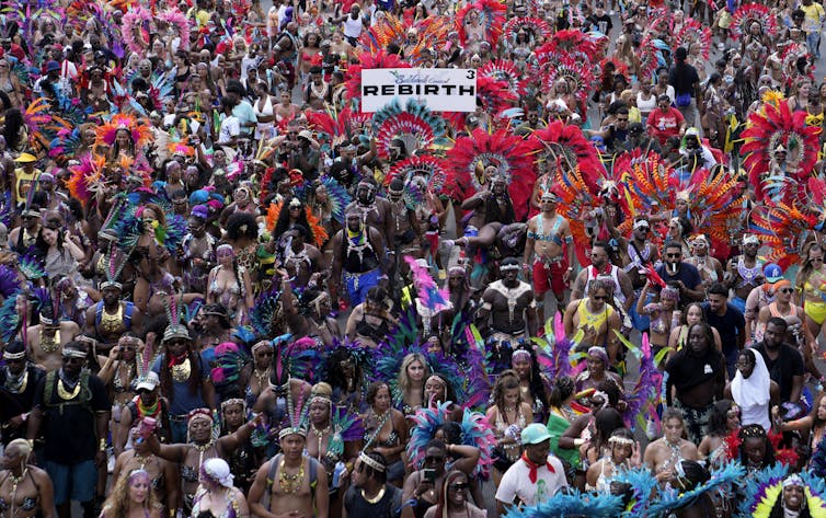 A large group of people in costumes at a carnival